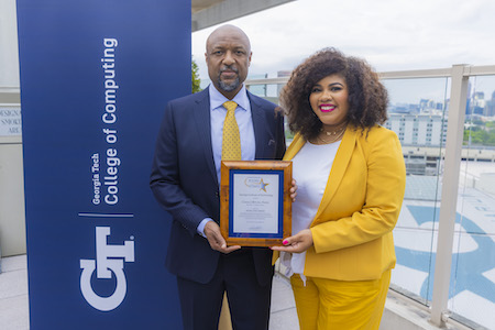 Georgia Tech Dean of Computing Charles Isbell with alumna and Rising Star Award winner Candace Mitchell